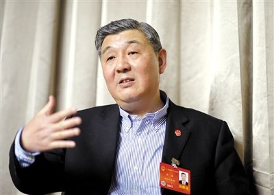 今年全國兩會期間，全國人大代表、浙江高院院長齊奇接受記者采訪。新京報記者 陳杰 攝