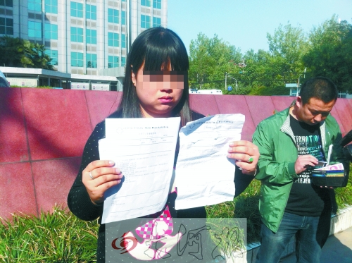 拿著兩份檢查結(jié)果完全相反的報(bào)告單,梁女士很郁悶。