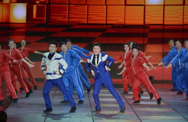 《小蘋果》、《最炫民族風(fēng)》等廣場舞曲將會有全國統(tǒng)一、編排科學(xué)、帶給人正能量的全新動作。 CFP 資料