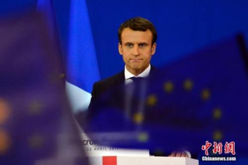 圖為馬克龍在慶祝集會上。中新社記者 龍劍武 攝