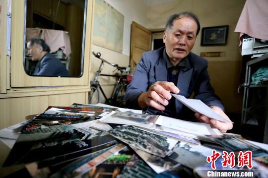 鄭州老人六年騎行五萬里 尋拍古建筑 鄭州老人六年騎行五萬里 尋拍古建筑